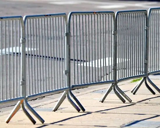 Temporary crowd control fencing for secure access.